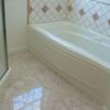 The tile work was completed around the tub and marble floors were put into the Master Bath.